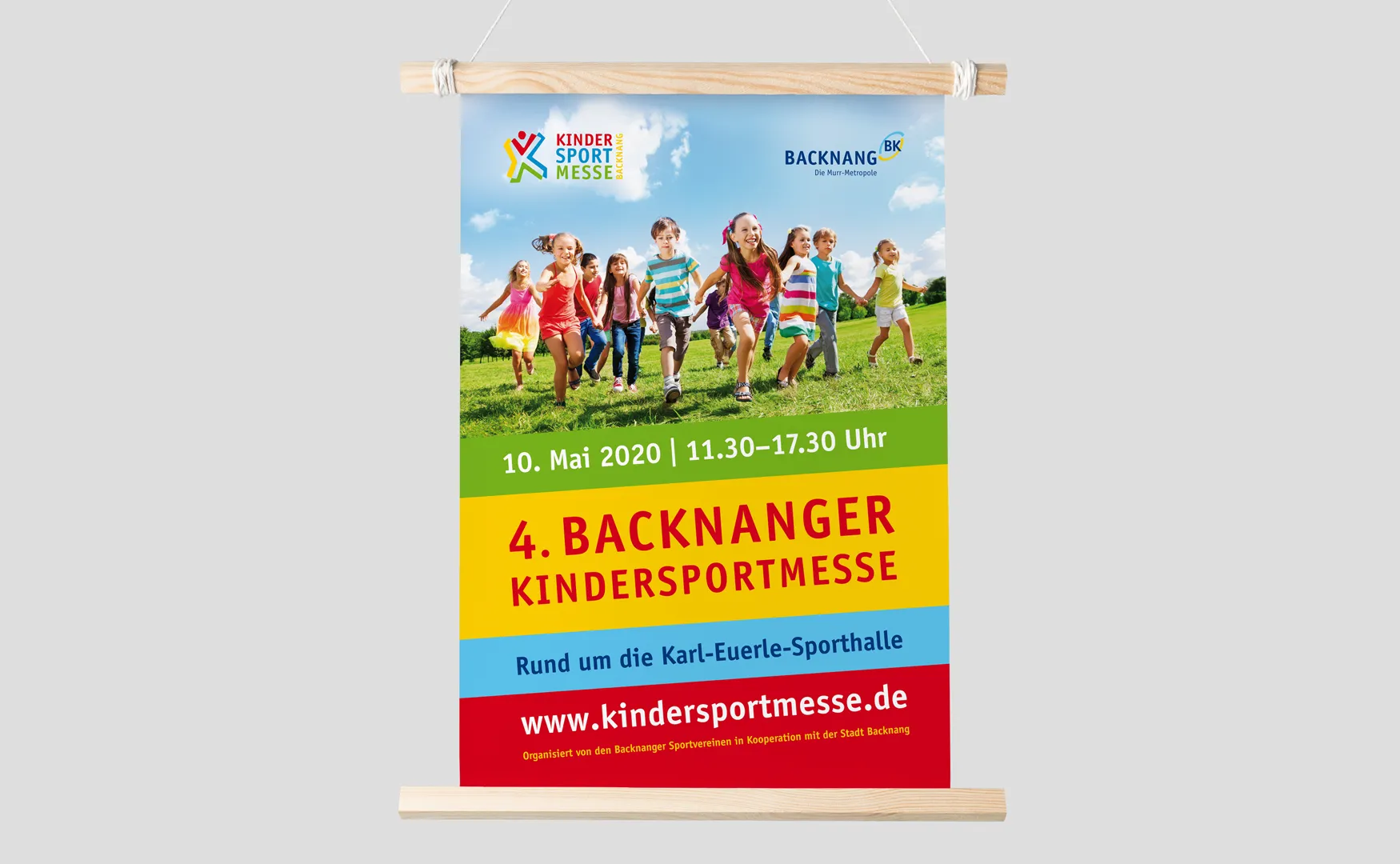Poster der 4. Backnanger Kindersportmesse am 10. Mai 2020 an einer Holzleiste